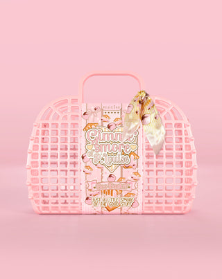 Pink waffle-style boo basket with a product inside on a pink background