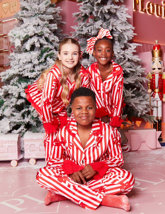Kerstpyjama van snoepgoed voor kinderen