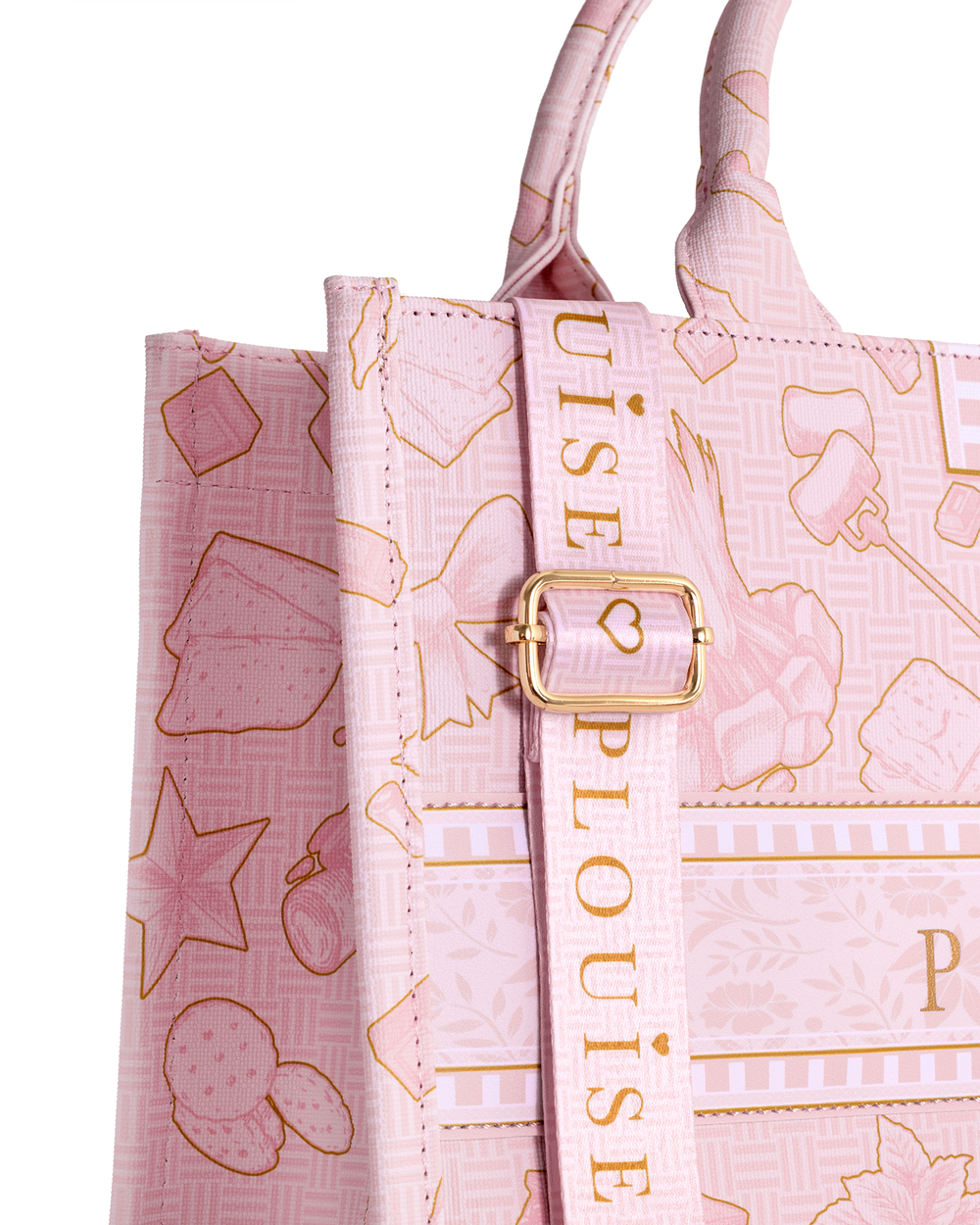 A close-up of a light pink tote bag with a gold outline pattern of desserts and the vertical text 'P.LOUISE' on a central strap, featuring a gold buckle closure.