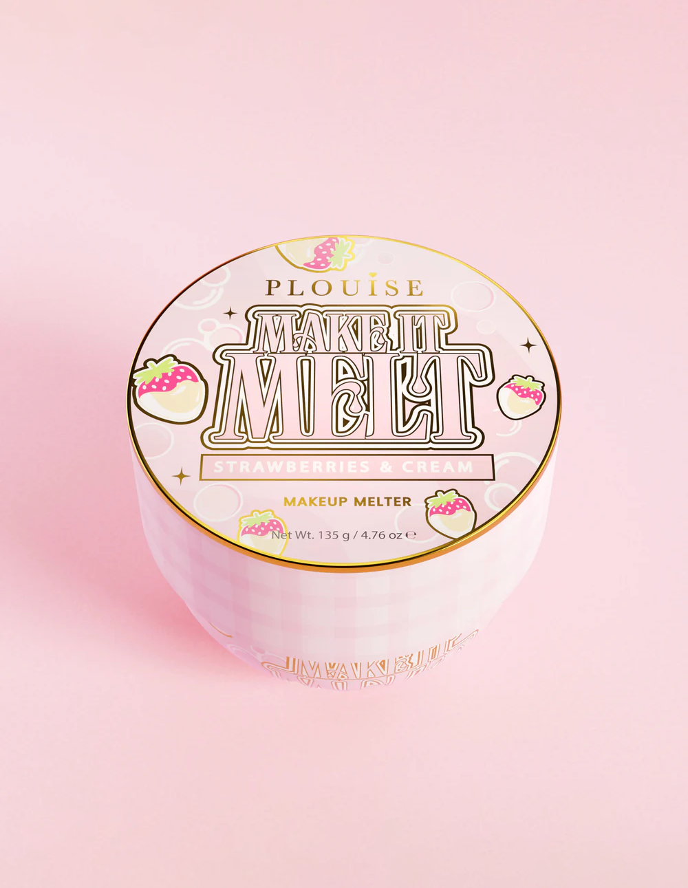 Een potje P.Louise Make It Melt Makeup Cleansing Balmr met een roze label en gouden accenten op een roze achtergrond