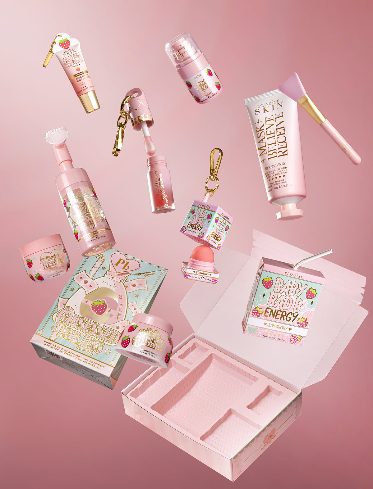P.Louise Strawberry Obsessed For Bad Bitch full collection floating unboxed on a pink background