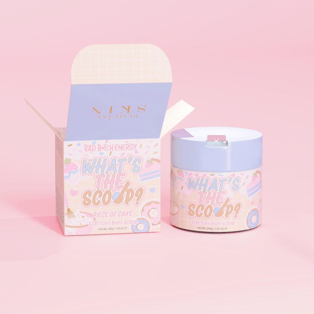 P.Louise 'What's the Scoop?' stretchy body scrub in piece of cake scent with a cake design packaging on a pink background