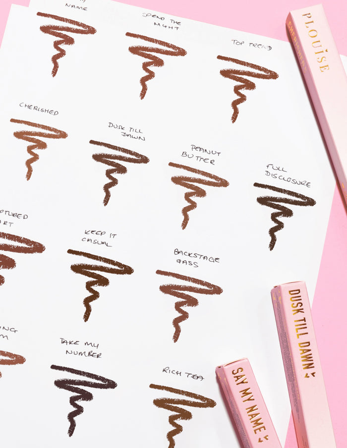 Een afbeelding van een vel papier met krabbels waarop elke kleur en naam van de P.Louise Ultimate Definition Sharpenable Lip Liner wordt weergegeven